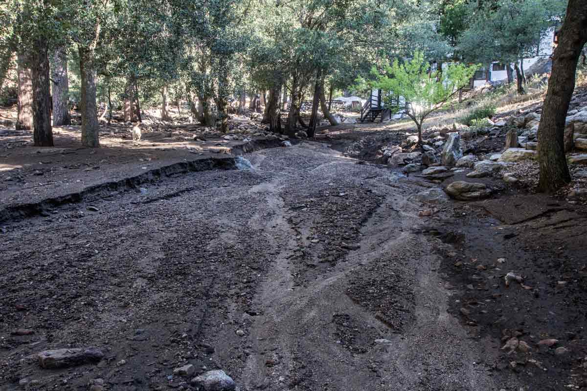 the whole area from the Buddha Hall down is buried in deep mud and rock