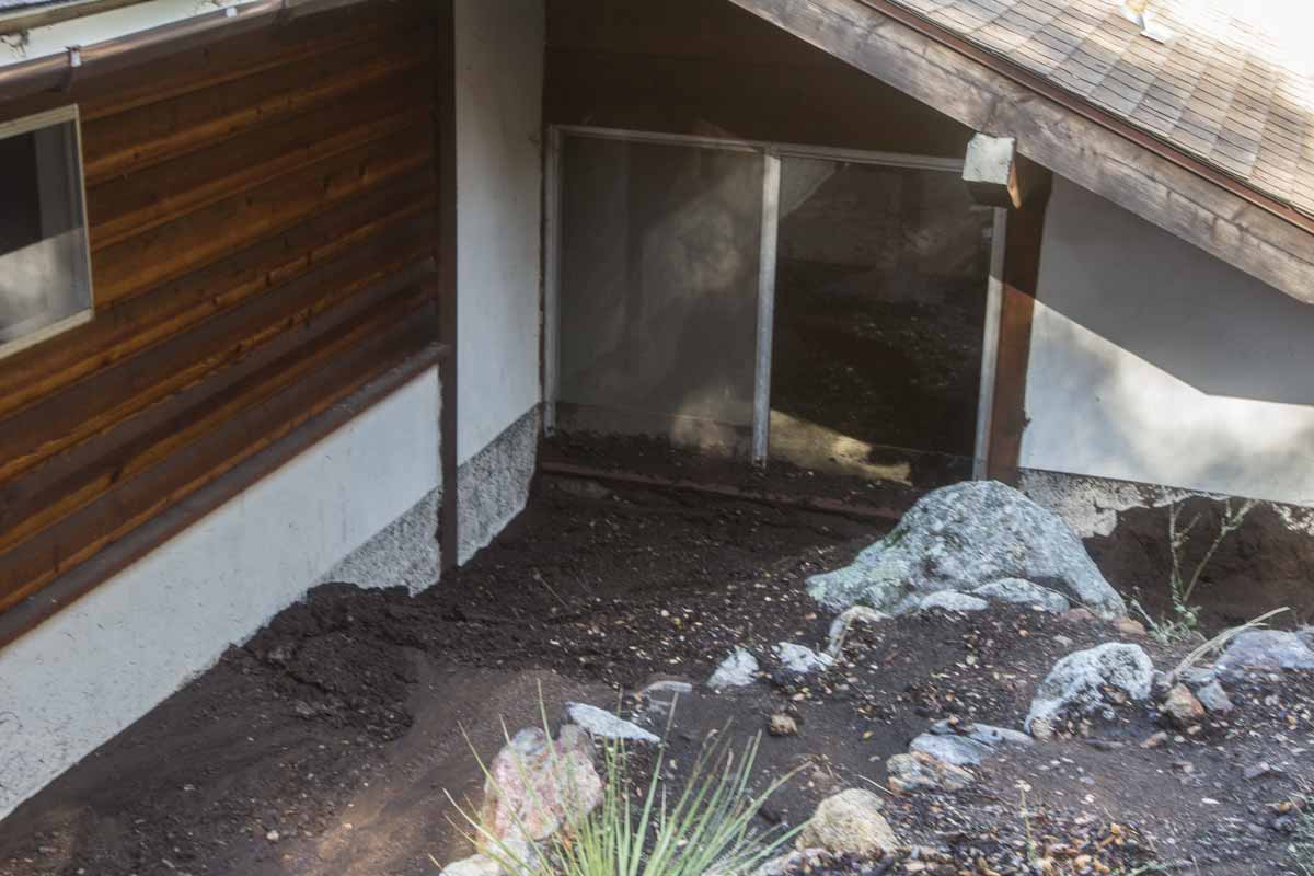 The mud is right up to the window. The drain for this area is about 5 feet below the level of the mud